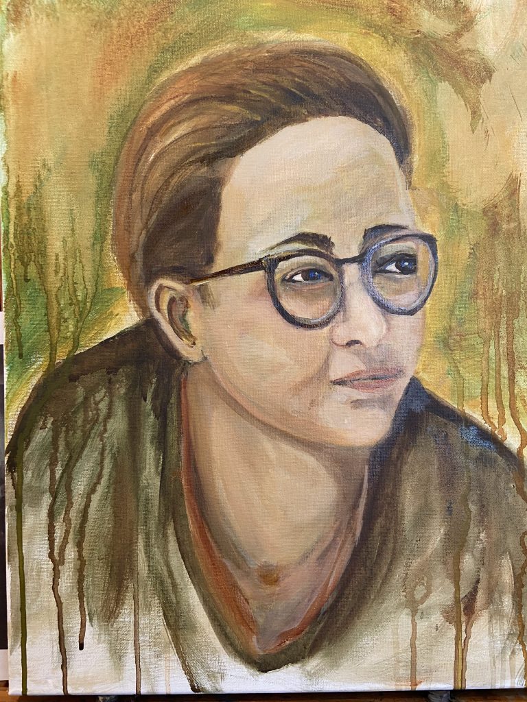 Finished oil portrait of a young woman wearing glasses