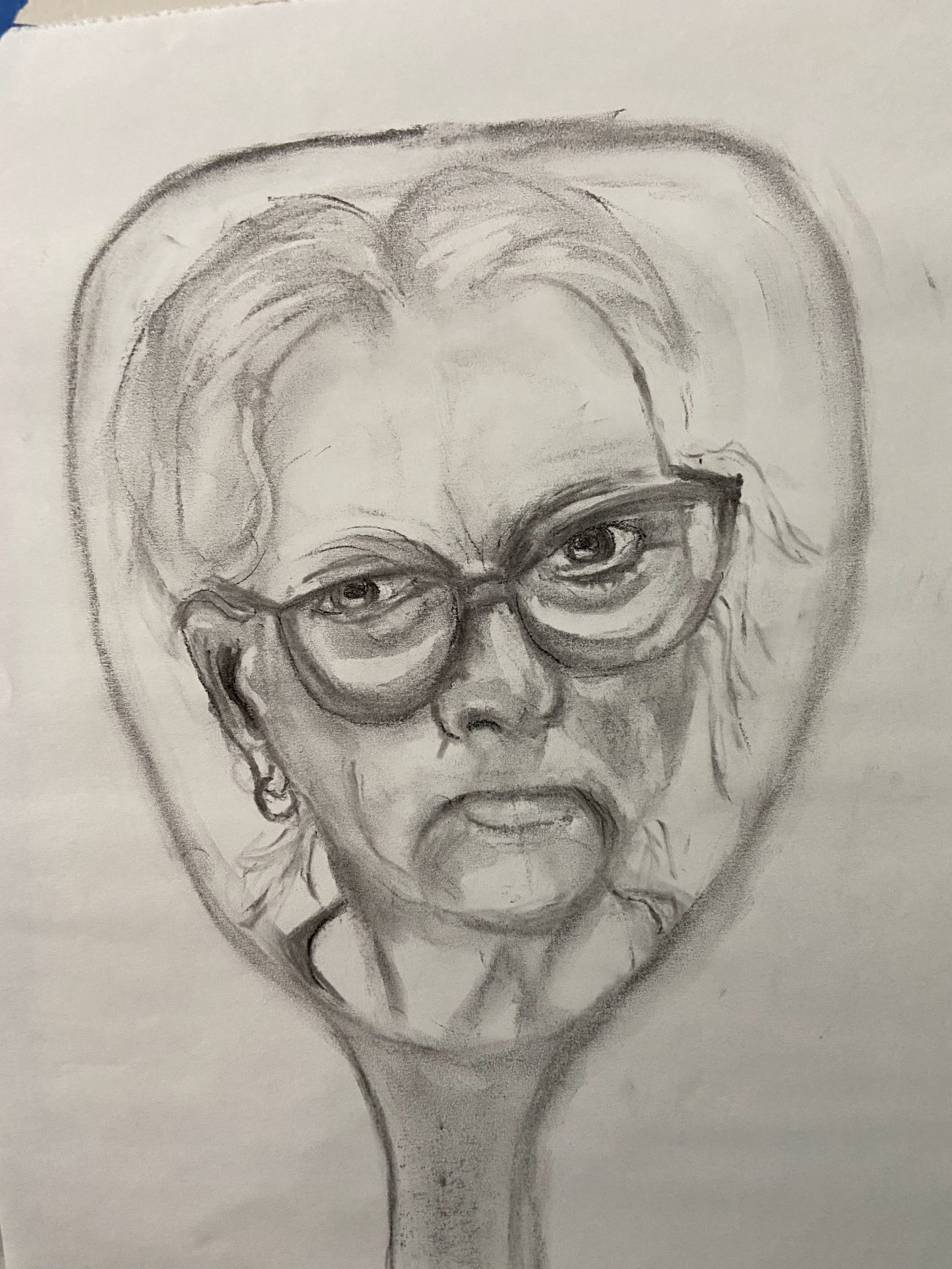 Charcoal drawing of the author's face