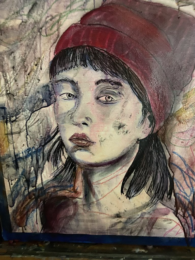 Painting of a girl with a knit hat done on watercolor paper and acrylic glaxes