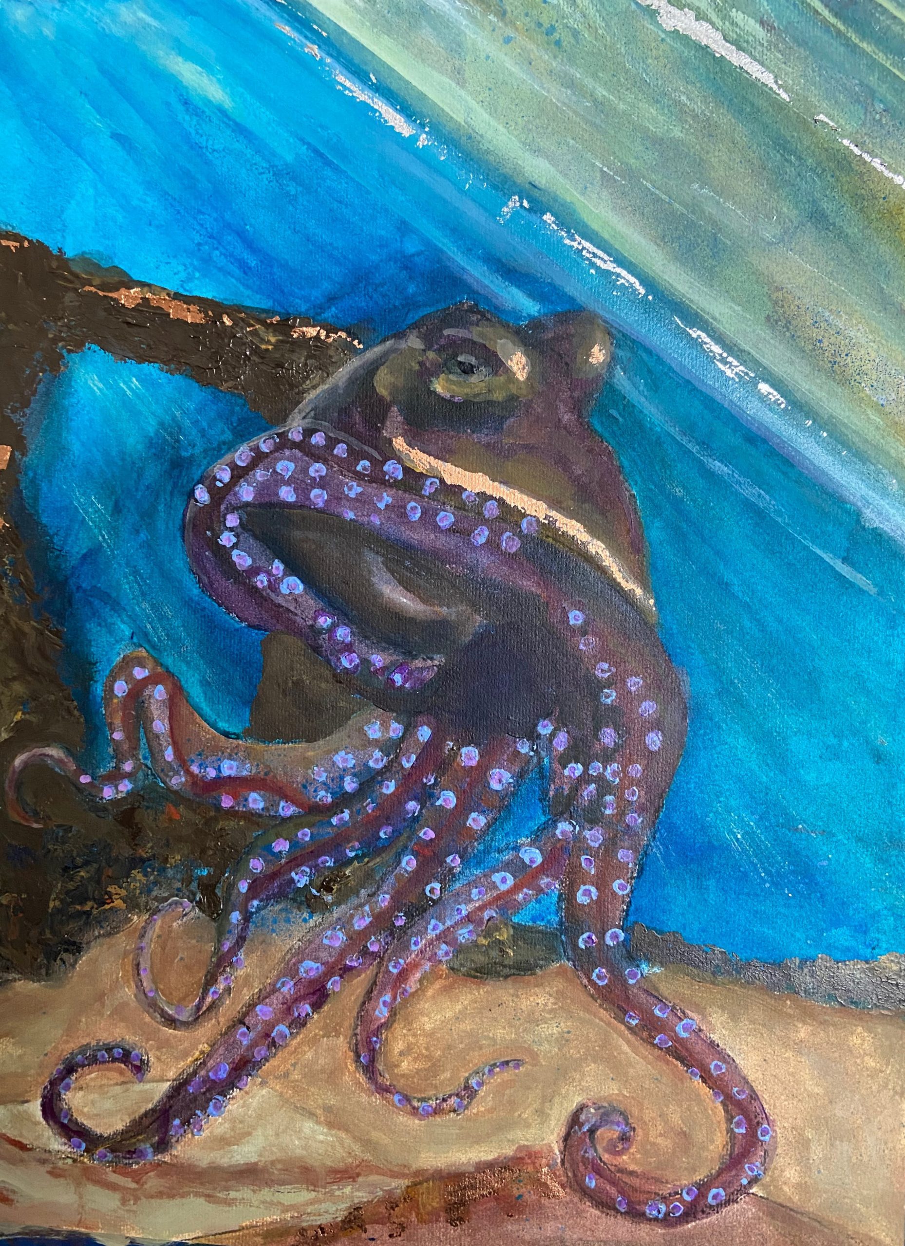 Finished painting of an octopus with metal leaf highlights