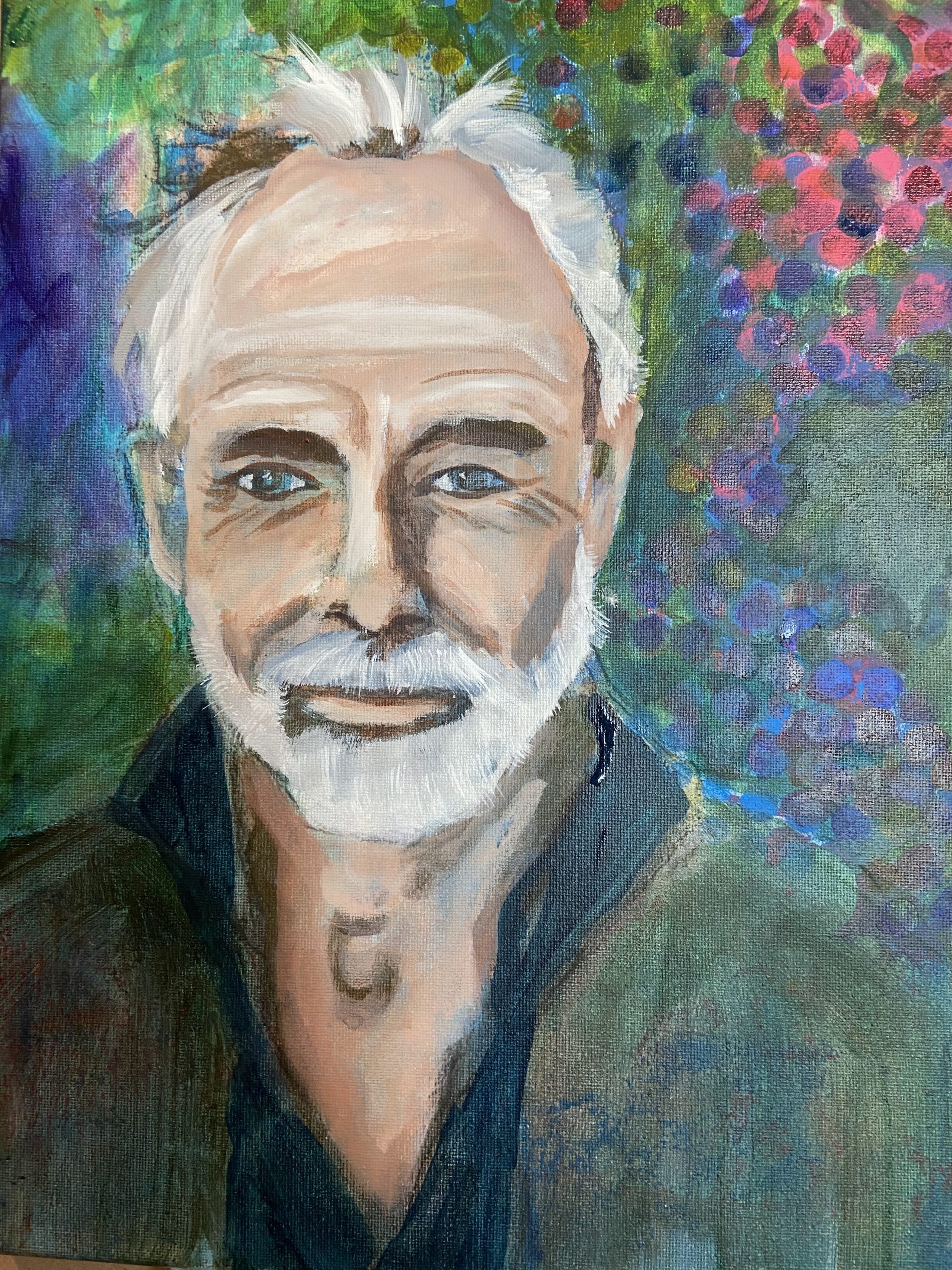 Portrait of a mature man surrounded by grapes done in acrylic paint