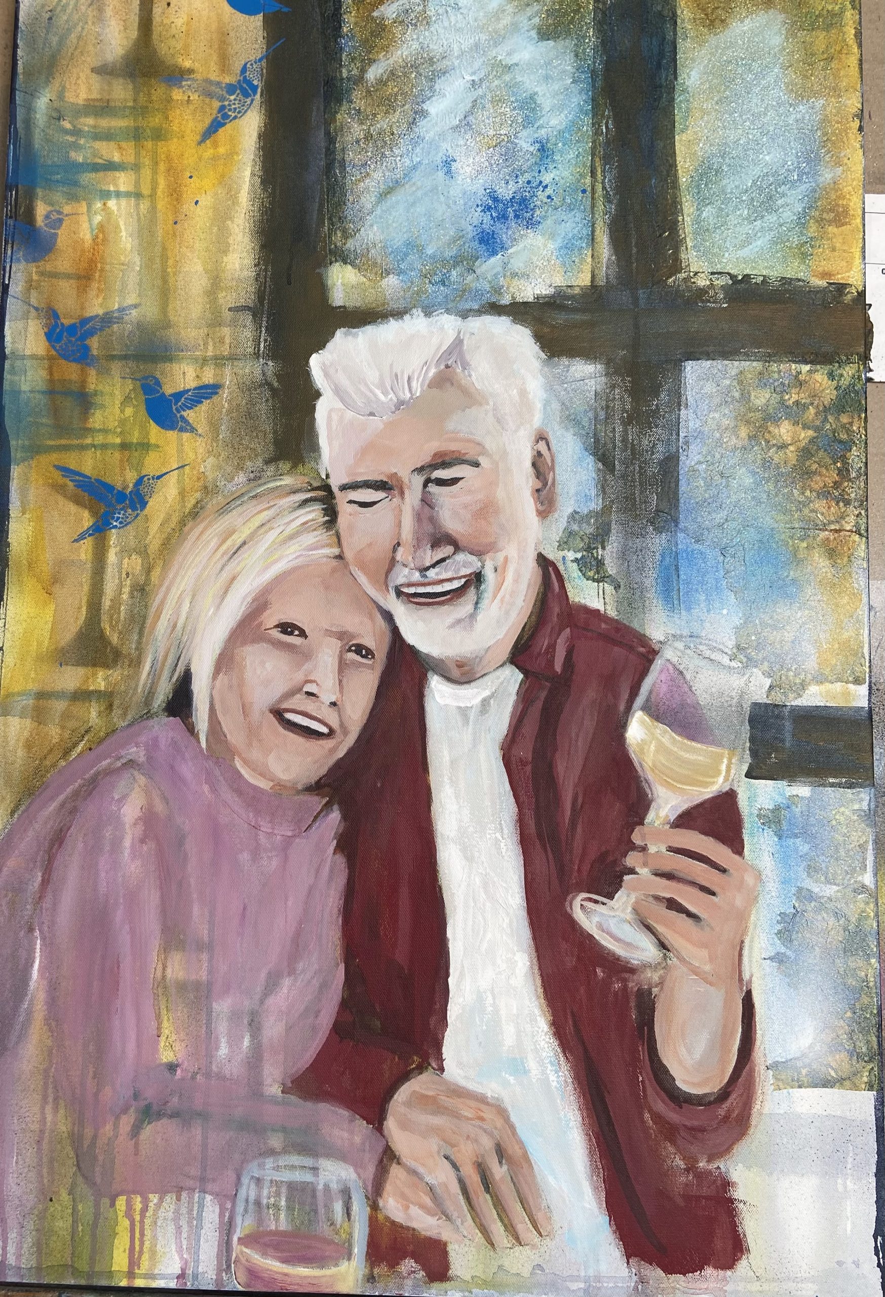 Canvas showing a couple drinking wine and hugging each other 
