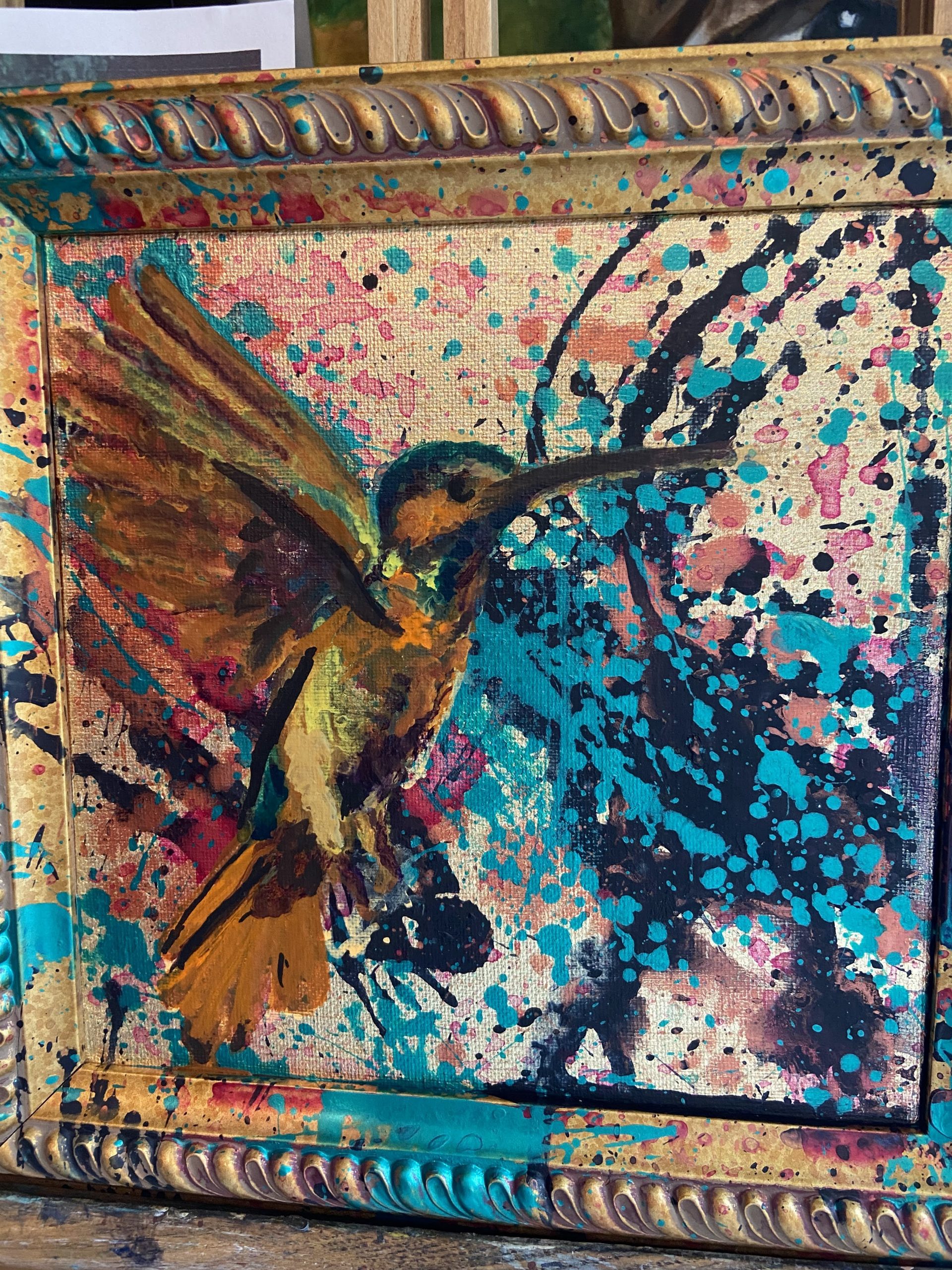 Hummingbird painted with acrylics on a splattered gold leaf canvas