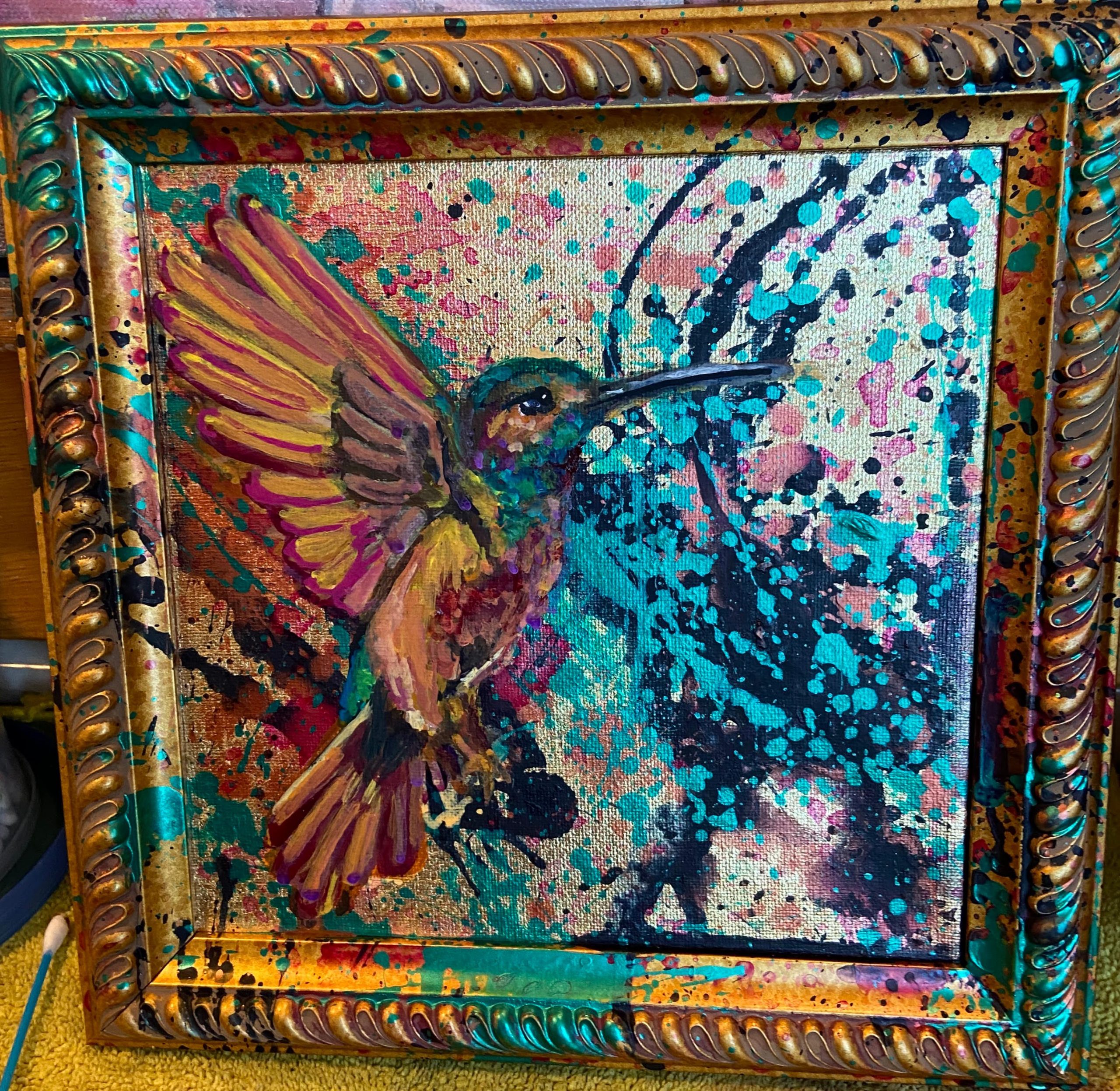 Hummingbird painting done with acrylics on a gold-leaf canvas