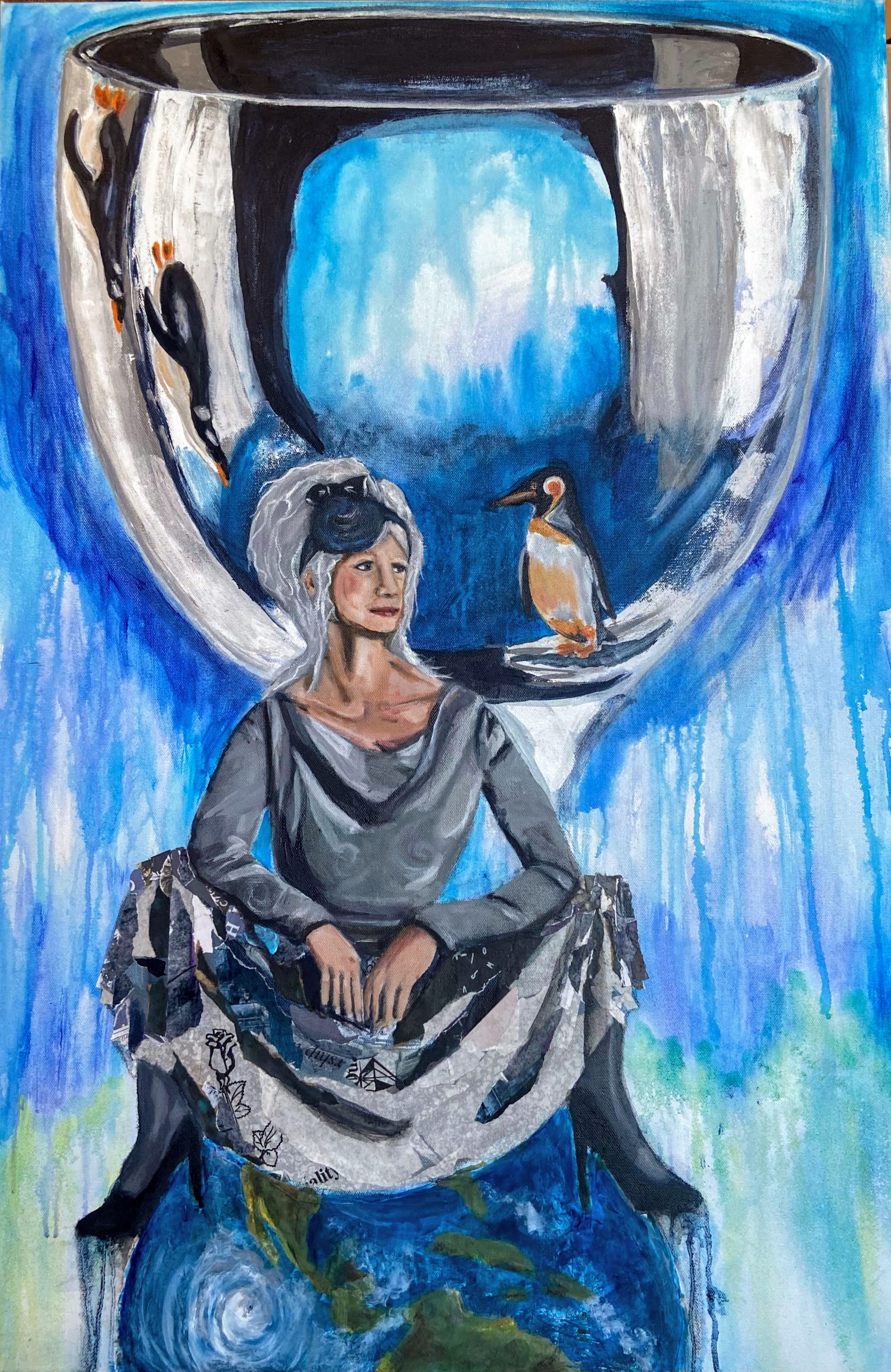 Finished painting of a woman sitting on top of the world . She is framed by a wine goblet with penguins in it. 