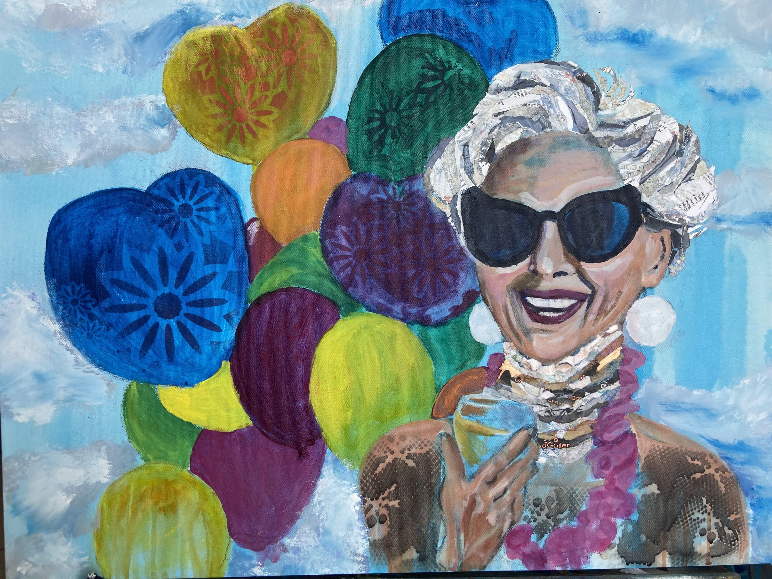 Painting of a happy senior lady smiling and holding a glass of wine against a backdrop of balloons. Her hair and necklaces are done in paper collage. 